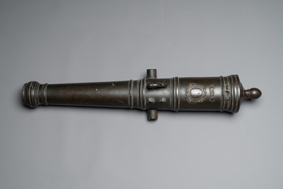 A Dutch bronze saluting cannon on a partly original carriage, inscribed C. Ouderogge Fecit, Rotterdam, dated 1641