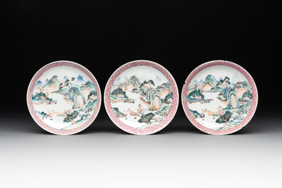 Two Chinese famille rose cups and three saucers with a fine landscape design, Yongzheng/Qianlong