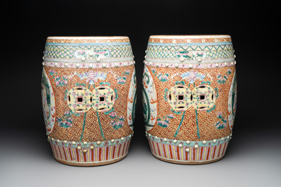A pair of Chinese famille rose 'dragon and phoenix' garden seats, 19/20th C.