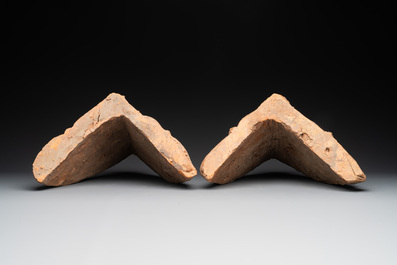 A pair of Cambodian terracotta architectural ornaments depicting Kala, late Khmer period