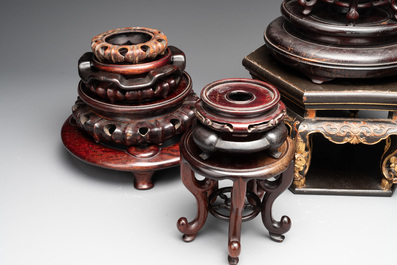 A large collection of 103 Chinese wooden stands, covers and other wood works, 19/20th C.