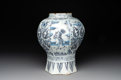 A blue and white Dutch Delft 'chinoiserie' tulip vase, a baluster vase and a pewter-mounted jug, 17th C.