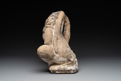 An Indian polychromed stone sculpture of a deity, 18/19th C.