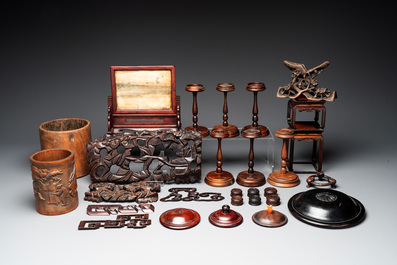 A large collection of 103 Chinese wooden stands, covers and other wood works, 19/20th C.