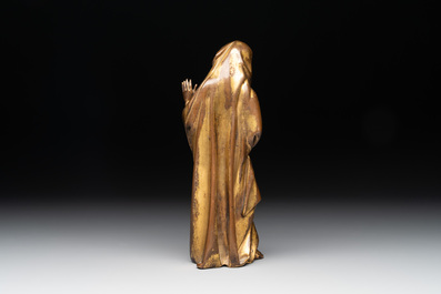 A gilt bronze figure of the Virgin of the Annunciation, probably 15th C.