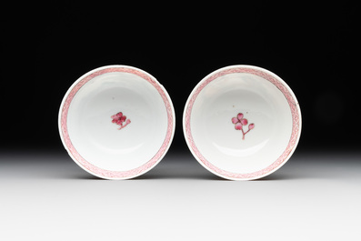 Two Chinese famille rose cups and three saucers with a fine landscape design, Yongzheng/Qianlong
