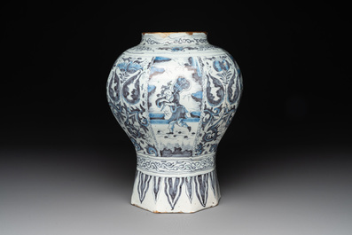A blue and white Dutch Delft 'chinoiserie' tulip vase, a baluster vase and a pewter-mounted jug, 17th C.