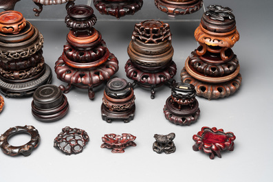 A large collection of 103 Chinese wooden stands, covers and other wood works, 19/20th C.