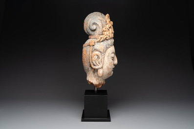 A large Chinese polychromed wooden head of Guanyin, probably Ming