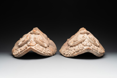 A pair of Cambodian terracotta architectural ornaments depicting Kala, late Khmer period