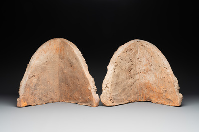 A pair of Cambodian terracotta architectural ornaments depicting Kala, late Khmer period
