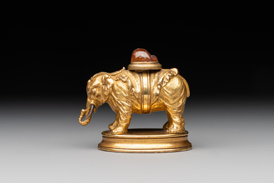 A Chinese pink quartz-inset gilt bronze elephant, 18th C.