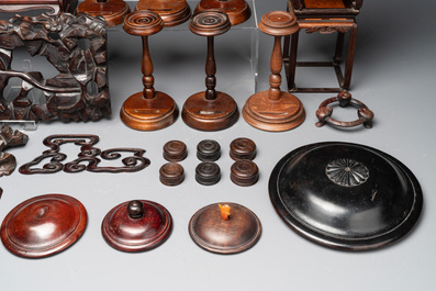 A large collection of 103 Chinese wooden stands, covers and other wood works, 19/20th C.
