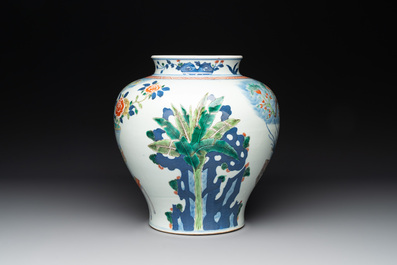 A Chinese wucai vase and seven blue and white jarlets, 19th C.