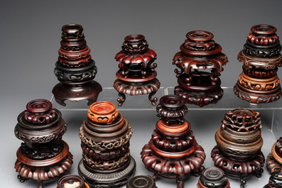 A large collection of 103 Chinese wooden stands, covers and other wood works, 19/20th C.
