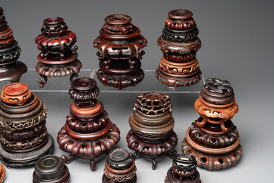 A large collection of 103 Chinese wooden stands, covers and other wood works, 19/20th C.