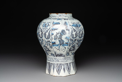 A blue and white Dutch Delft 'chinoiserie' tulip vase, a baluster vase and a pewter-mounted jug, 17th C.