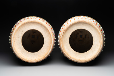 A pair of Chinese famille rose 'dragon and phoenix' garden seats, 19/20th C.