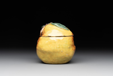 A polychrome Dutch Delft apple-form box and cover, 18th C.