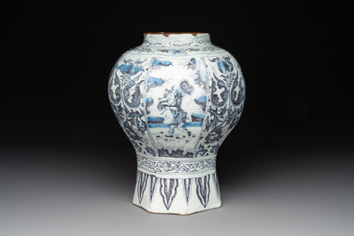 A blue and white Dutch Delft 'chinoiserie' tulip vase, a baluster vase and a pewter-mounted jug, 17th C.