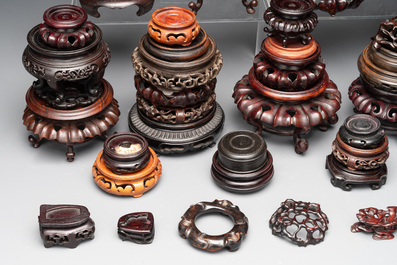 A large collection of 103 Chinese wooden stands, covers and other wood works, 19/20th C.