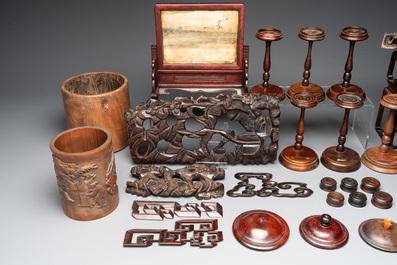 A large collection of 103 Chinese wooden stands, covers and other wood works, 19/20th C.