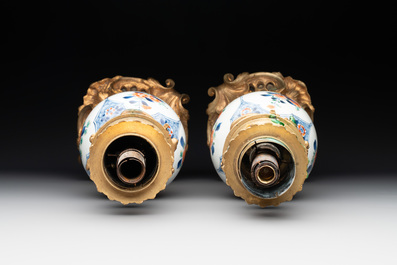 A pair of Chinese famille verte vases mounted as lamps, Kangxi