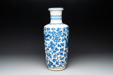 A Chinese blue and white 'phoenix and peony scroll' rouleau vase, Kangxi