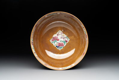 A Chinese famille rose capucin-brown-ground bowl and two plates, Qianlong