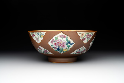 A Chinese famille rose capucin-brown-ground bowl and two plates, Qianlong