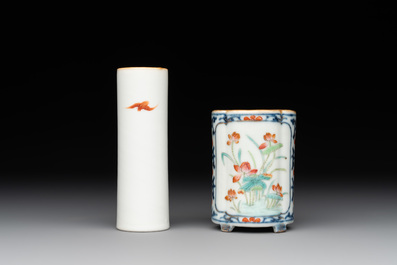A pair of Chinese famille rose plaques, two brush pots, a saucer and a covered box, Qianlong mark, 18/19th C.