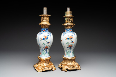 A pair of Chinese famille verte vases mounted as lamps, Kangxi