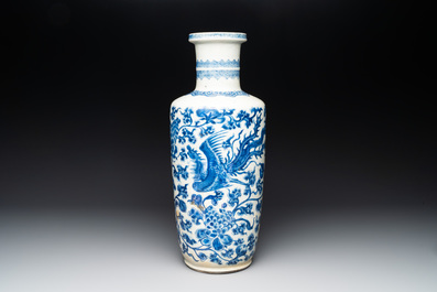 A Chinese blue and white 'phoenix and peony scroll' rouleau vase, Kangxi