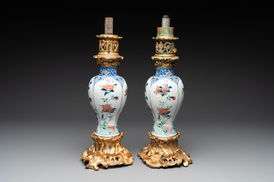 A pair of Chinese famille verte vases mounted as lamps, Kangxi
