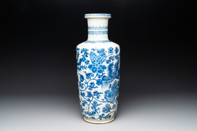 A Chinese blue and white 'phoenix and peony scroll' rouleau vase, Kangxi
