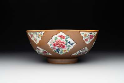 A Chinese famille rose capucin-brown-ground bowl and two plates, Qianlong