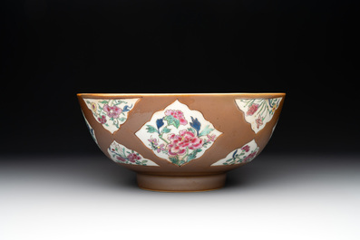 A Chinese famille rose capucin-brown-ground bowl and two plates, Qianlong