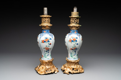A pair of Chinese famille verte vases mounted as lamps, Kangxi