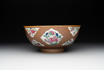 A Chinese famille rose capucin-brown-ground bowl and two plates, Qianlong