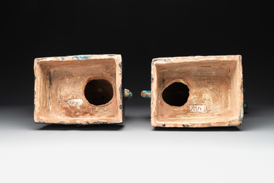 A pair of Chinese turquoise-and-aubergine-glazed Buddhist lions on stands, probably Swatow kilns, 19th C.
