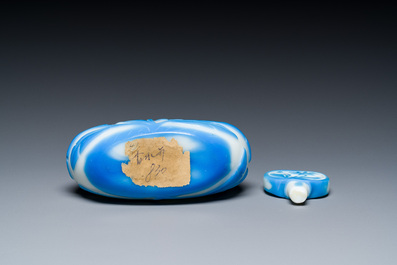 A Chinese blue-overlay white Beijing glass 'meiping' vase, a bowl and a bottle, 19/20th C.