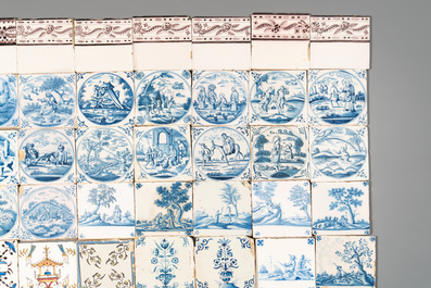 A collection of 54 blue, white, manganese and polychrome Dutch Delft tiles, 17/18th C