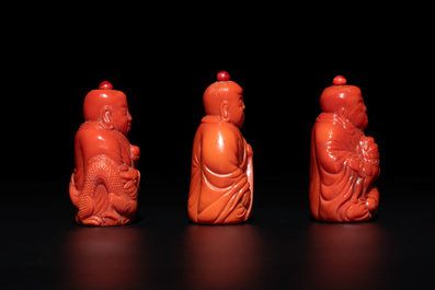 A set of ten Chinese coral-red glass Luohan-form snuff bottles, 20th C.