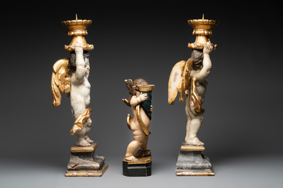 Three gilt and polychromed wooden angel-form candlesticks, Germany, 18th C.