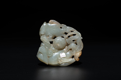 A Chinese jade carving with two Buddhist lions, 19th C.