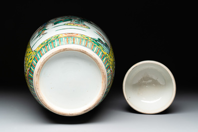 A pair of Chinese famille verte yellow-ground vases and covers with narrative design, 19th C.