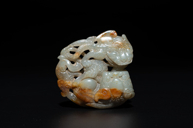 A Chinese jade carving with two Buddhist lions, 19th C.