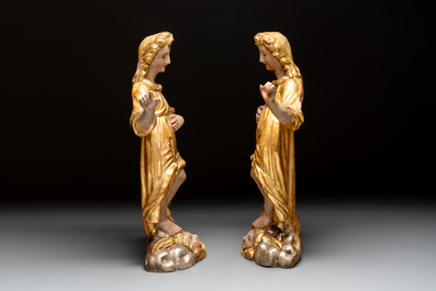 A pair of gilt and polychromed wooden figures of angels, Germany, 18th C.