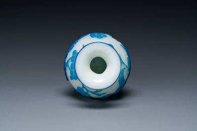 A Chinese blue-overlay white Beijing glass 'meiping' vase, a bowl and a bottle, 19/20th C.