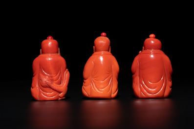 A set of ten Chinese coral-red glass Luohan-form snuff bottles, 20th C.